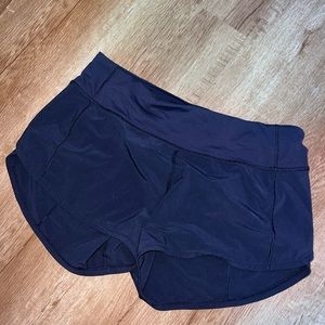 Navy Lulu running shorts.